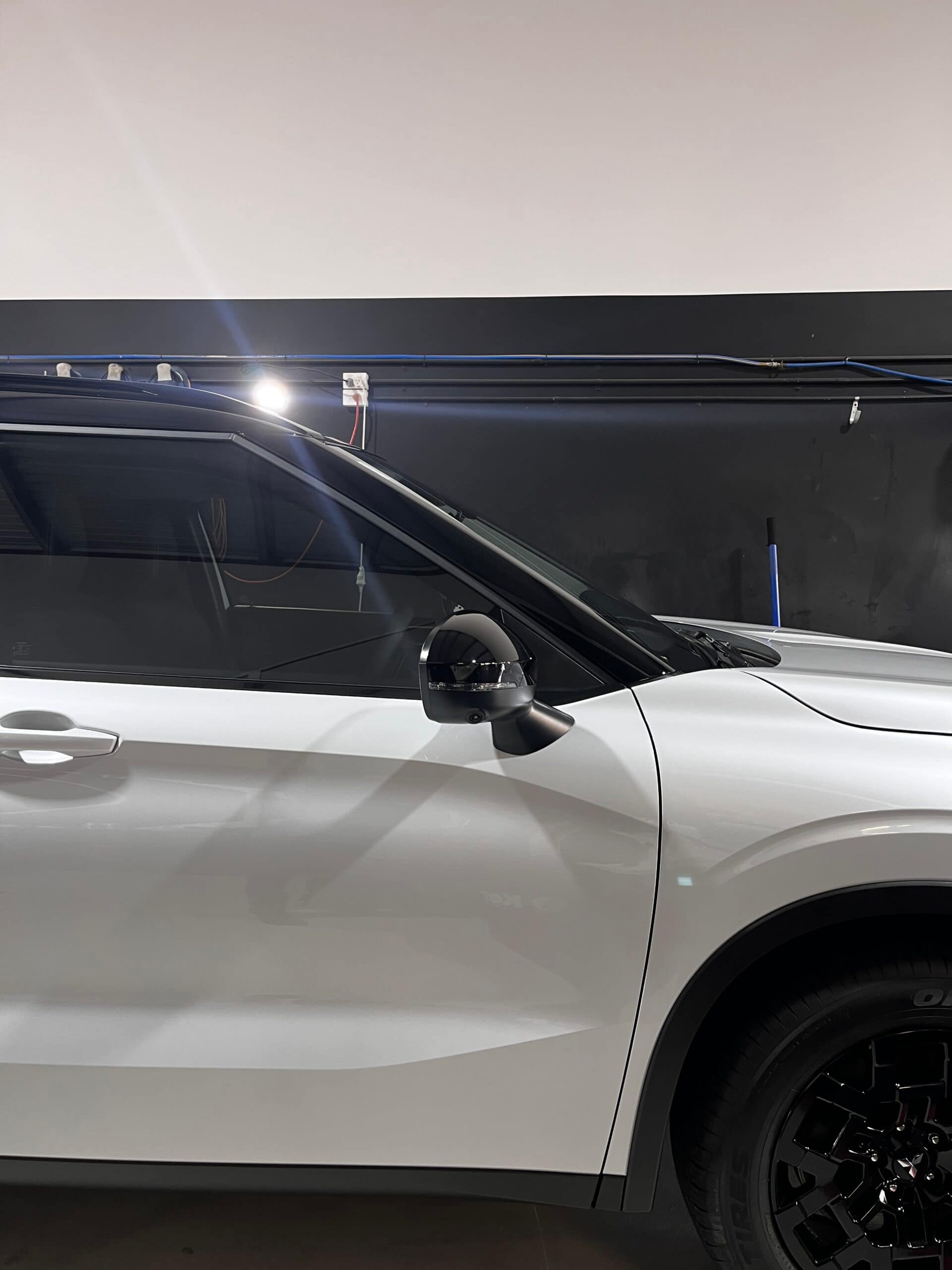 Pearl-White Mitsubishi Outlander New-Car Protection