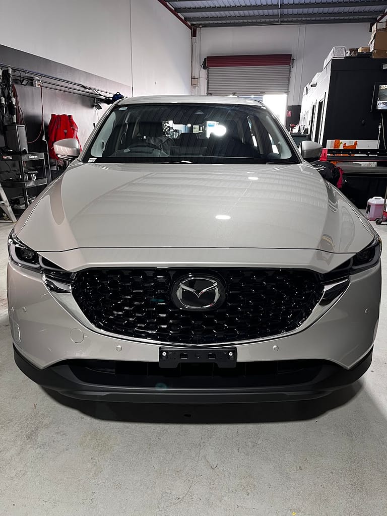 Mazda CX-5 door and handle area prepared for a clean PPF installation