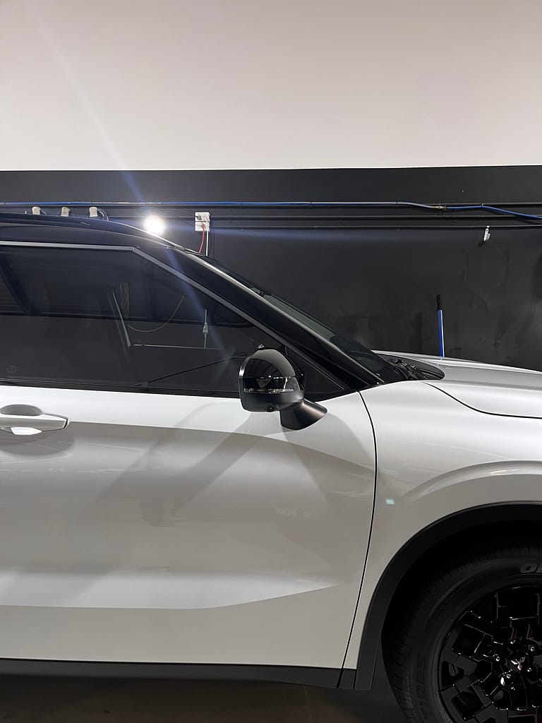 Pearl-white Mitsubishi Outlander after FMJ new-car protection at AutoFX WA