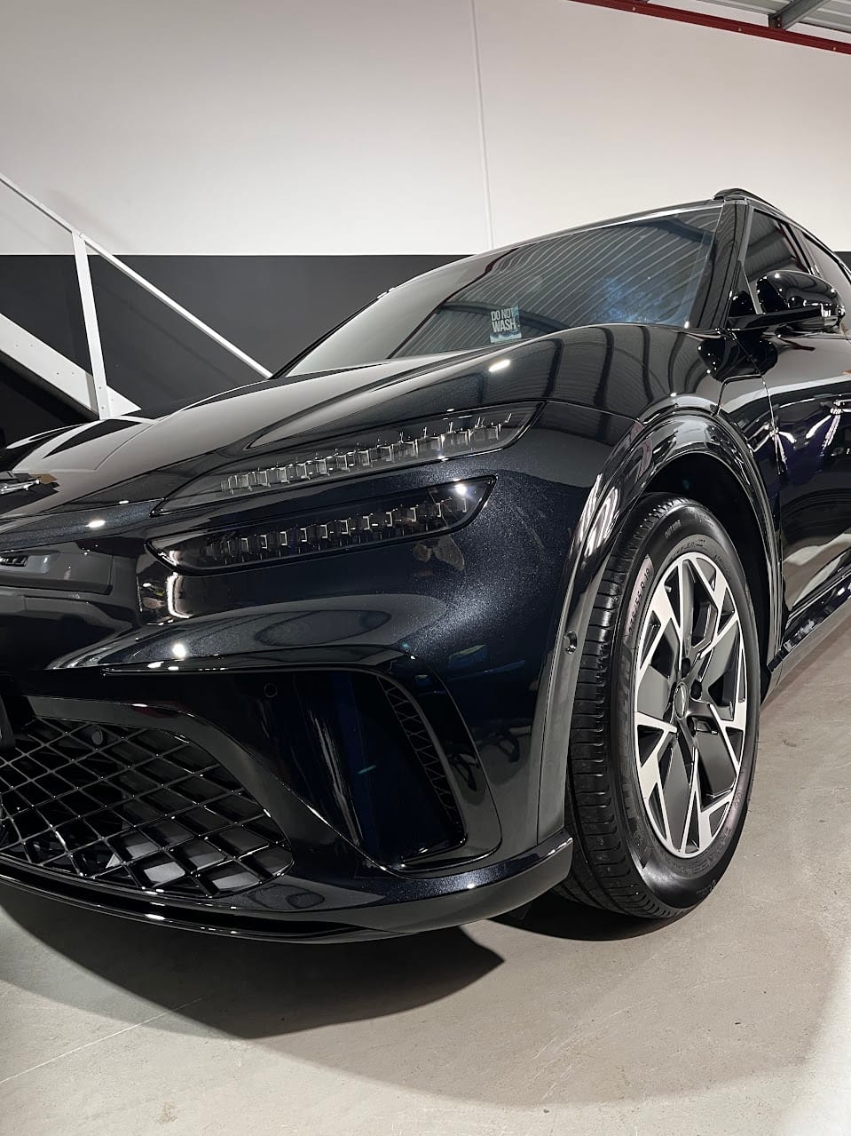 Black Genesis GV60 after OPTiX FMJ graphene ceramic coating at AutoFX WA